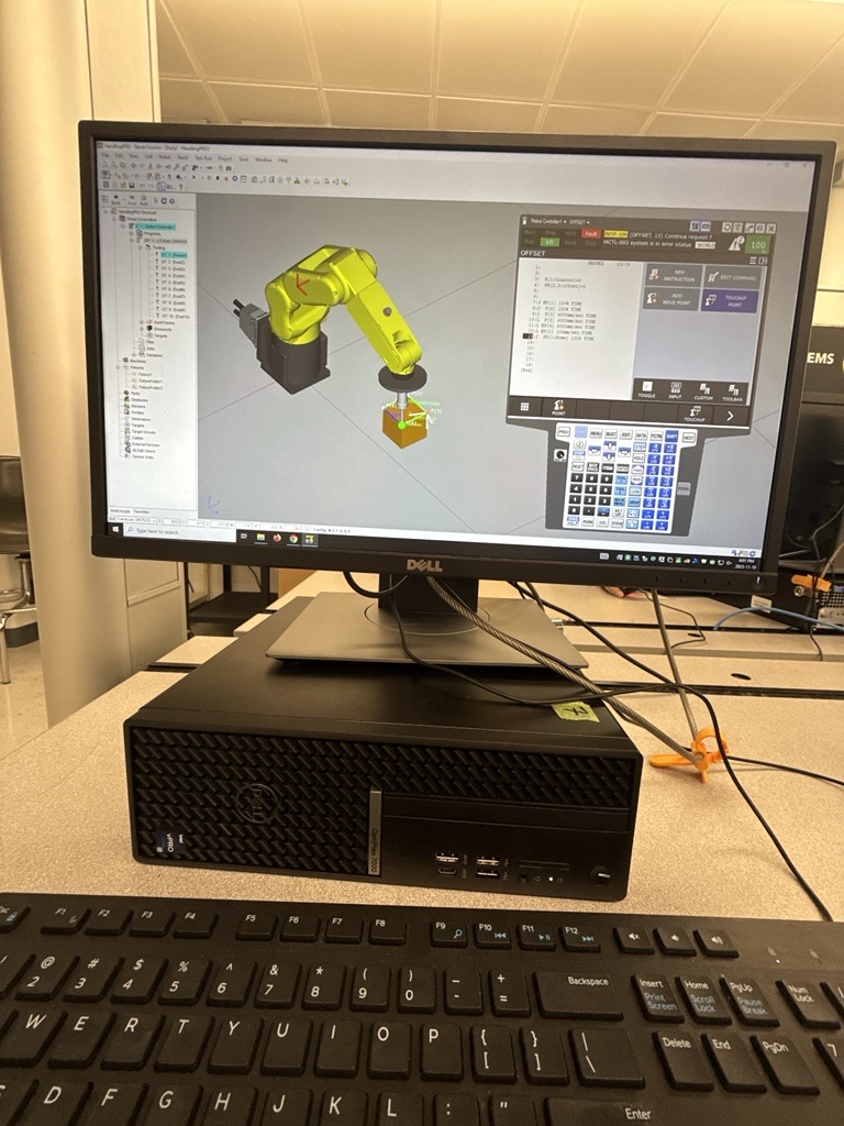 Industrial robot simulation and teach-pendant programming environment